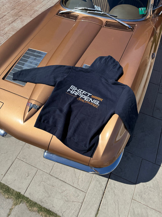 Cool car guy hoodie on hood of classic corvette. Shift Happens, Stay Stedfast logo on Navy Hoodie